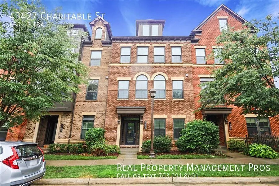 Experience elevated living in this exceptional four-level townhome for rent! — Photo 1