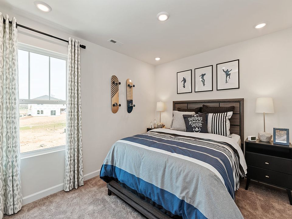 Secondary bedrooms give kids their own space to relax. Photography from Morgan Hills in Charlot