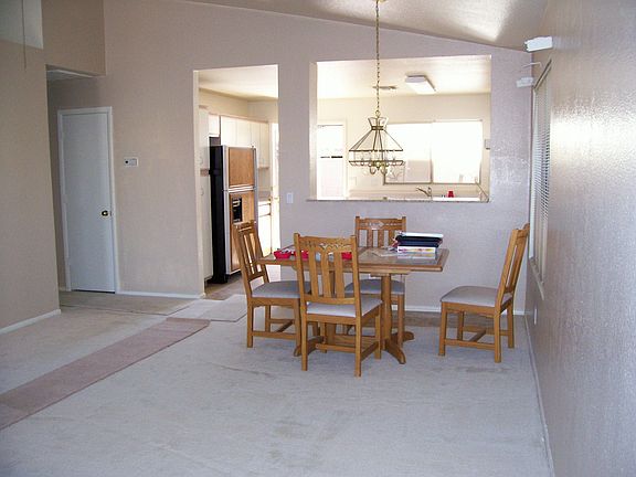 living room facing dining area& kitchen