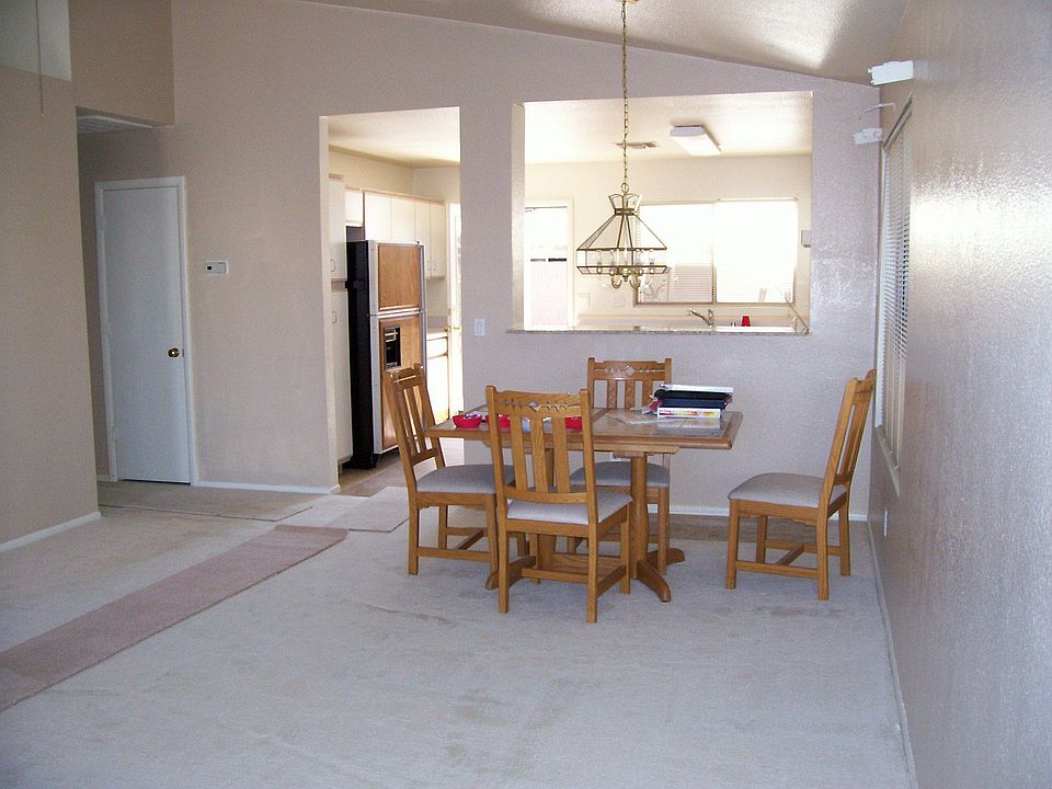 living room facing dining area& kitchen