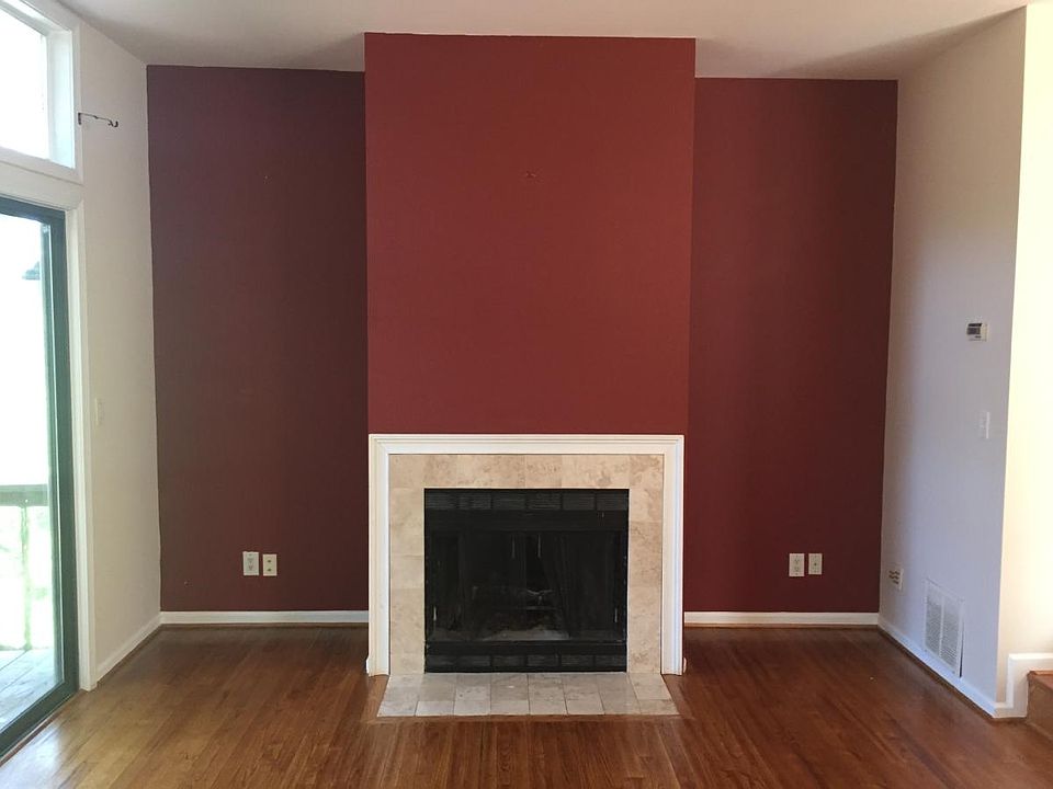 Sunken living room with wood burning fireplace