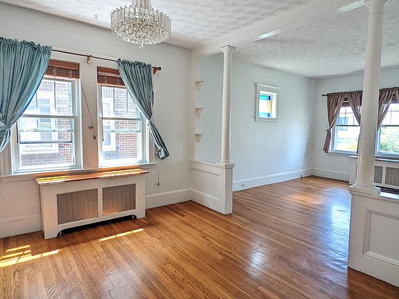 Spacious Living Room. Includes 5 windows