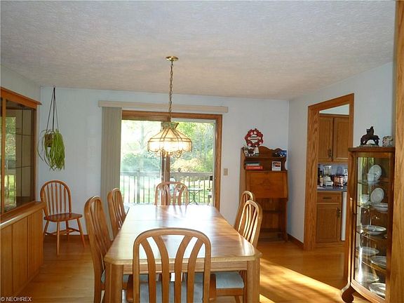 FORMAL DINING ROOM WITH HICKORY WOOD FLOORS AND TRIM