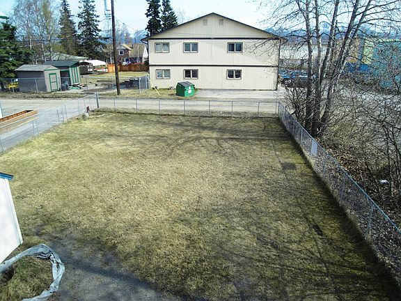 large, fenced backyard