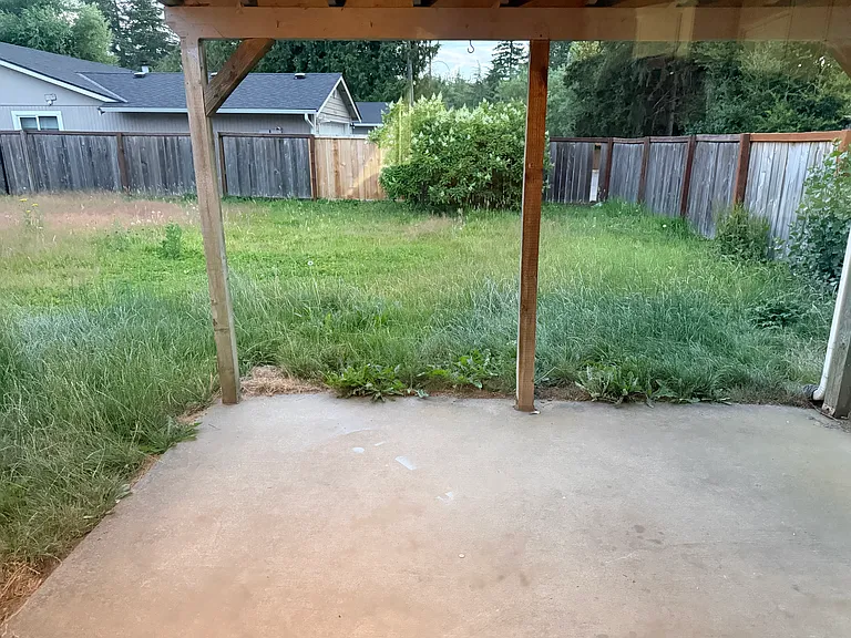 Back Yard- lawn to be mowed by move-in.
