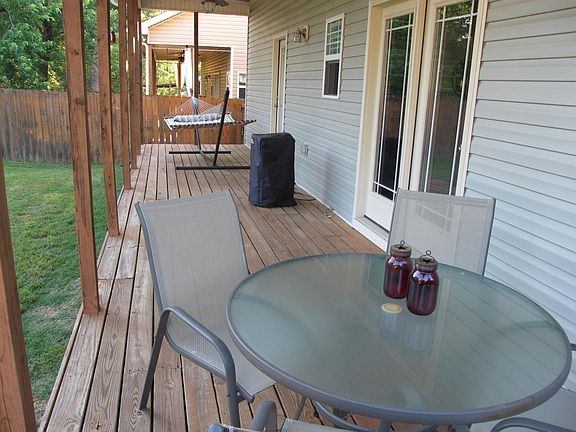 The porches on the front and back are both 700 square feet