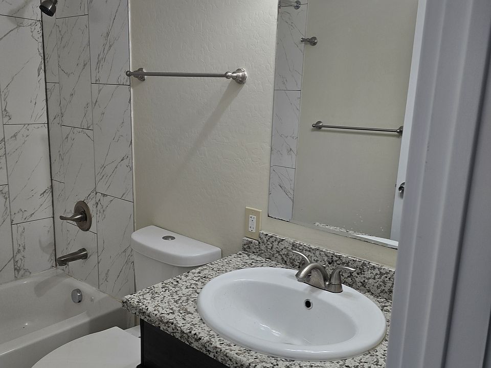beautiful bathrooms include a tub and shower!