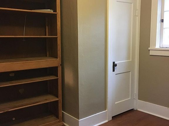 Bedroom two. Bookshelf remains.