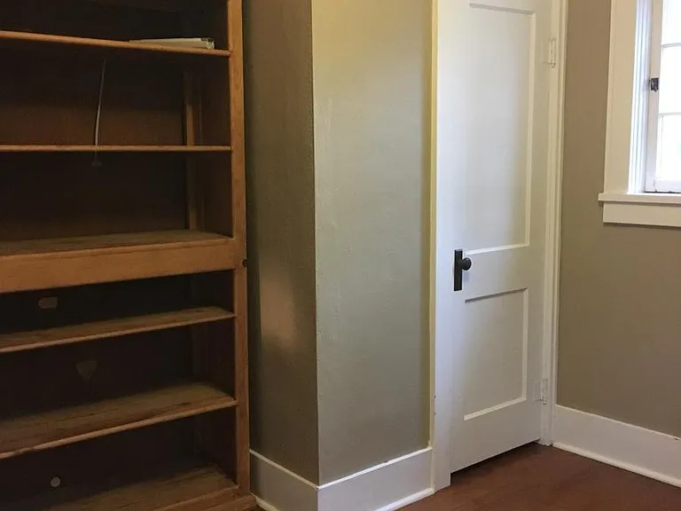 Bedroom two. Bookshelf remains.