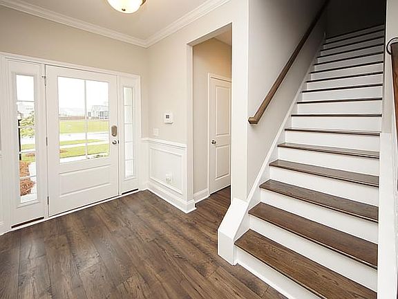 Photos are of a similar home