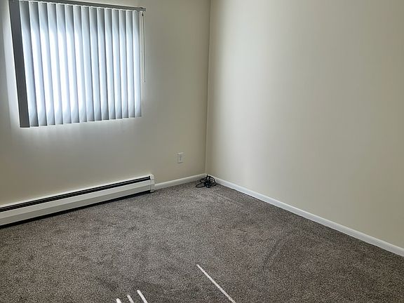 Bedroom with new carpet