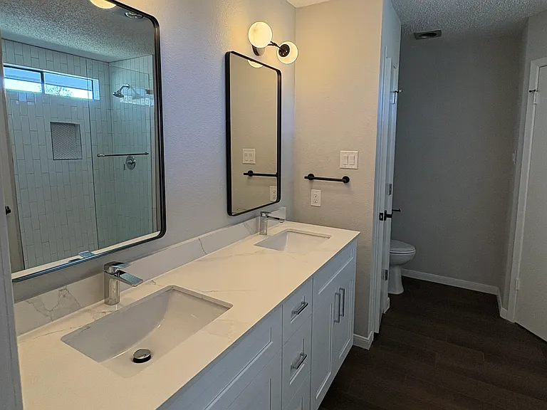 Master bath with double vanity, fully remodeled.