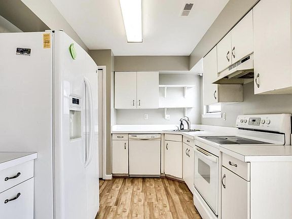 This photo was taken before we replaced the appliances - brand new stainless steel dishwasher, stove and we added a microwave.