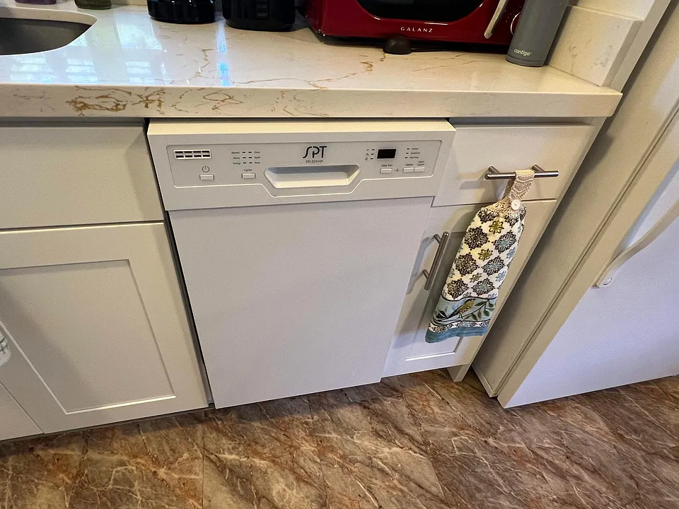 New dishwasher, microwave and other amenities in newly remodeled kitchen (new quartz counters)