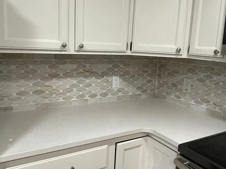 Kitchen has all new quartz countertops and stone backsplash