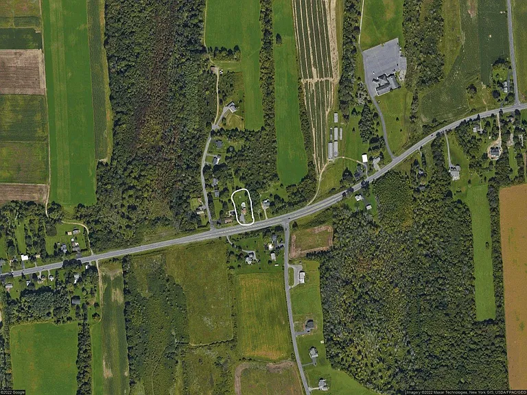 Large lot in private country setting but still close to all