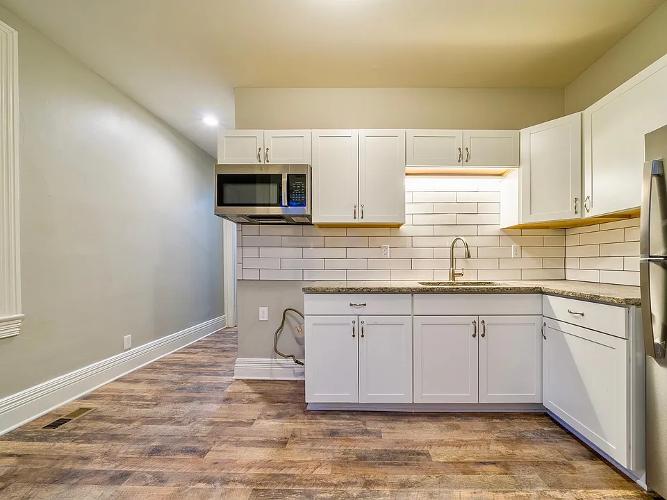 Brand New Kitchen with Granite Counters and custom back splash
