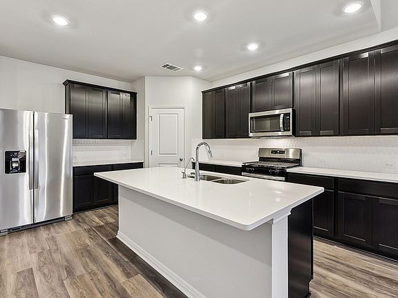 Cook a delicious meal in this beautiful kitchen.