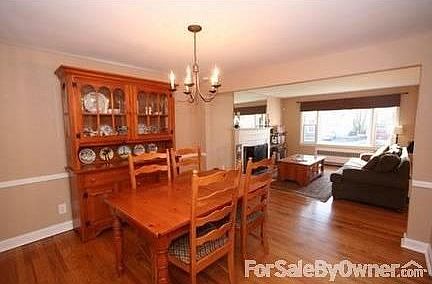 Dining Room : Formal DR has chair rail and a charming double dutch door to the sun porch.