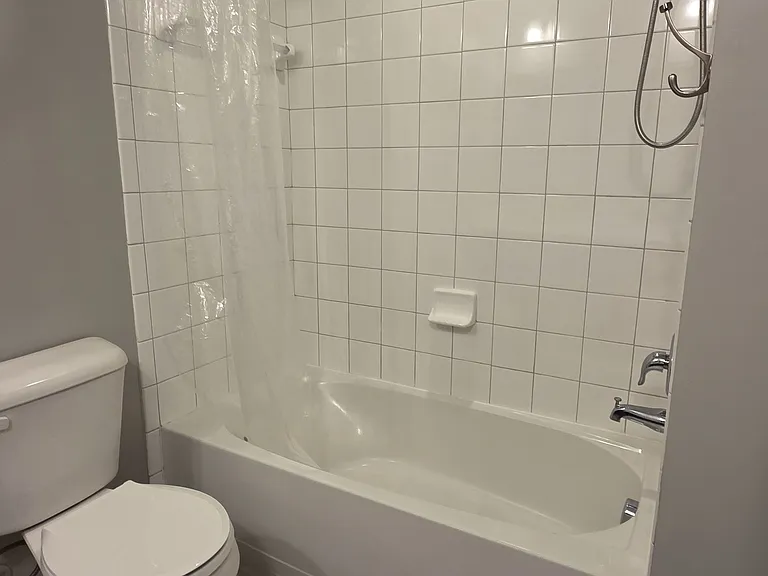 Full bath with double vanity located on third floor