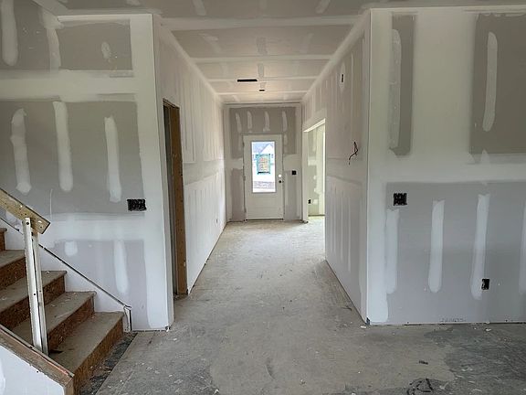 Foyer featuring the AW Collection R Serene - Soft light and open space create a calm welcome.