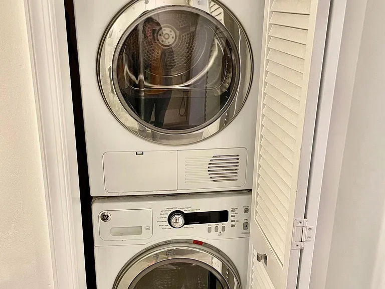 Washer and dryer within the bathroom