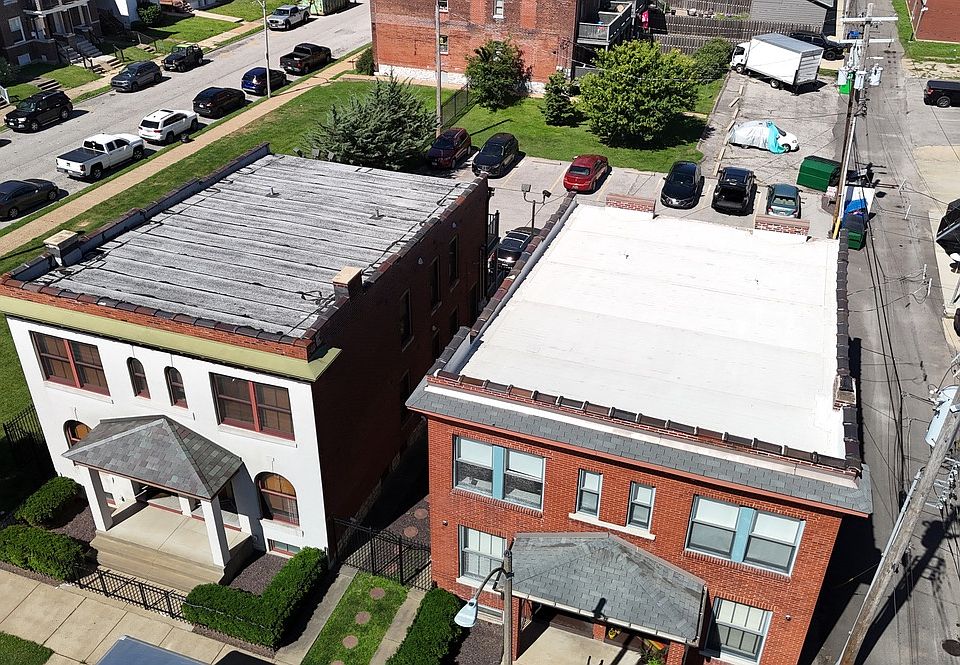 Drone view of 1121 and surroundings. Walk to the Grove, Forest Park, MOBotanical Garden, and more!