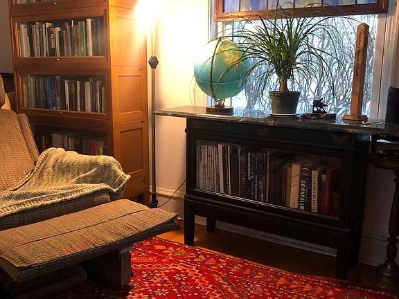 Sitting area in living room gets plenty of natural light.