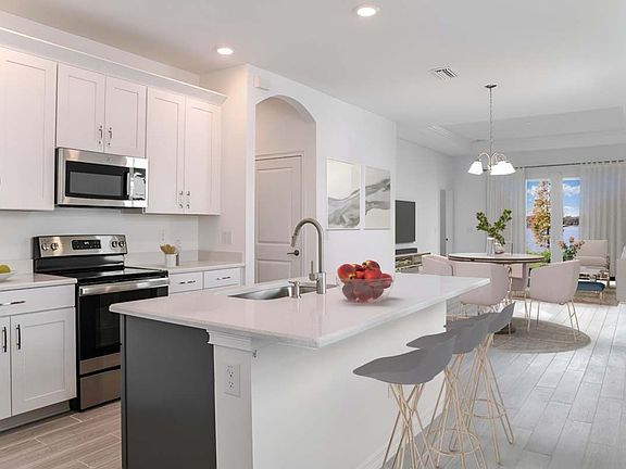 BridgeWater Flora Home Plan Kitchen and Living Room by William Ryan Homes Tampa