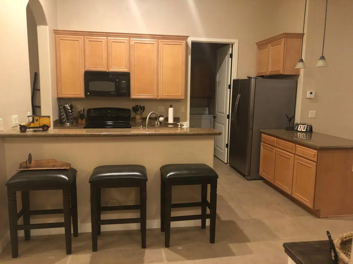 View of Kitchen and Laundry-room from Second Bedroom - 4241 N Pebblecreek Pkwy #6