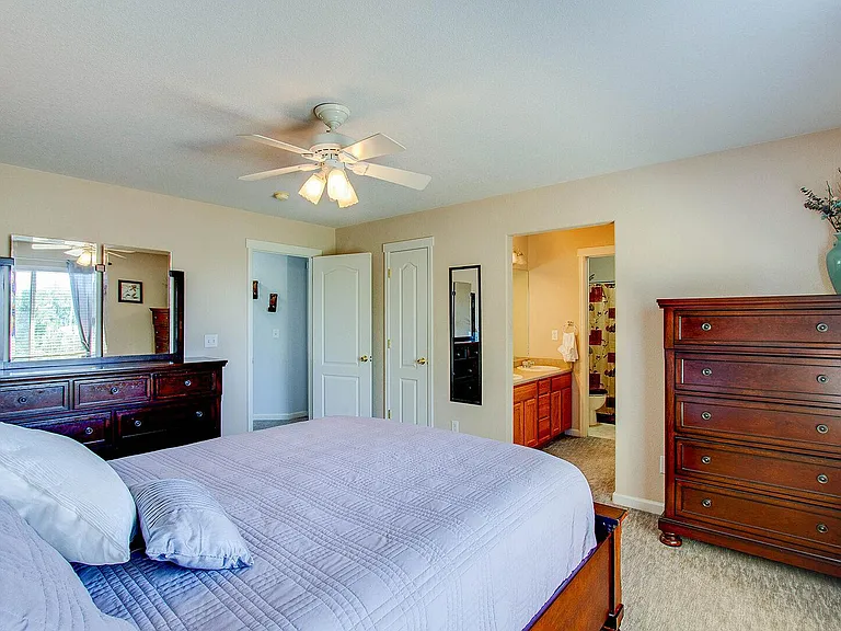 Master Bedroom #1 has a queen sized bed and a walk-in closet!