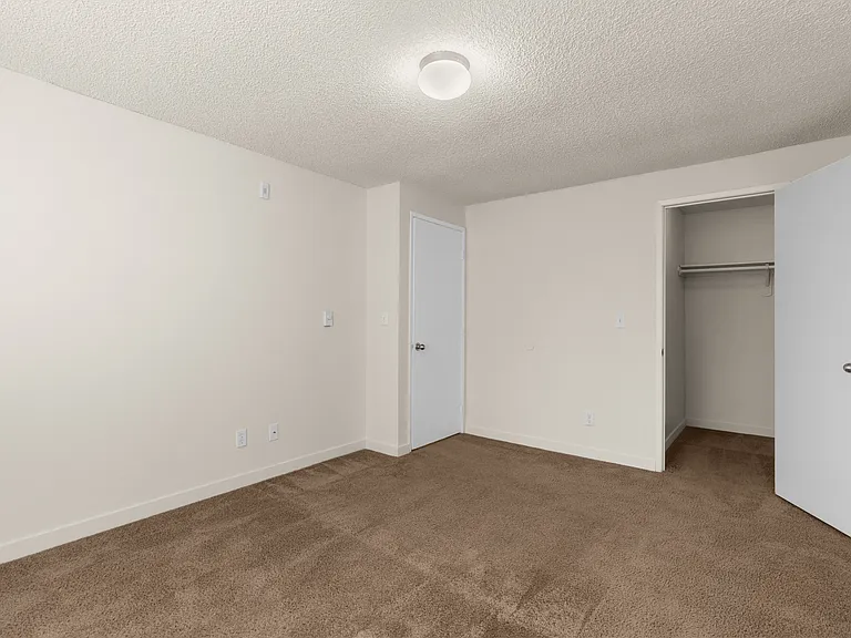 Explore this inviting bedroom, complete with cozy carpet flooring. Explore this inviting bedroom, complete with cozy carpet flooring.