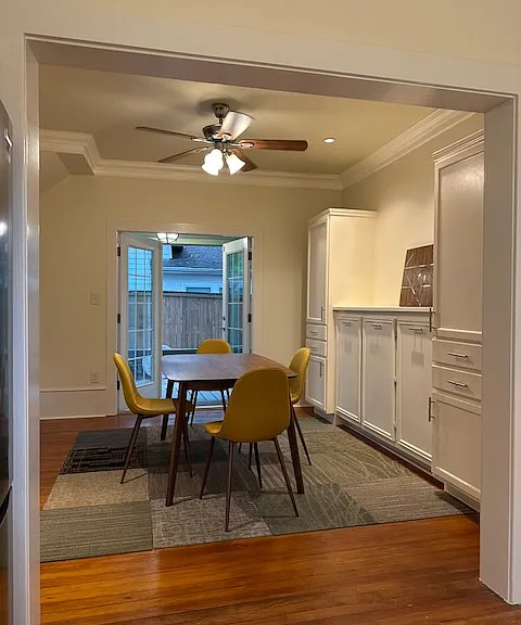 A view from the Kitchen. Table and chairs are in two arrangements as examples and for scale reference.