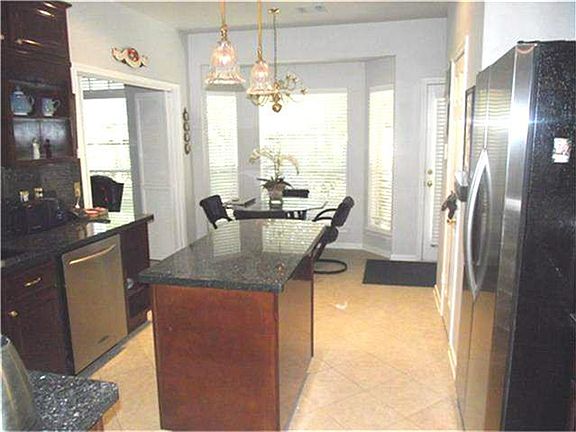 Kitchen looking to breakfast area.