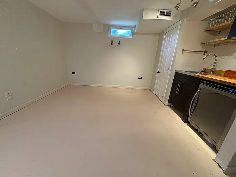 Bonus 408 Sq. Ft. Basement space with beverage fridge and sink