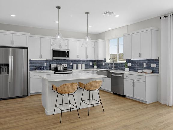 Open kitchen with decorative lighting