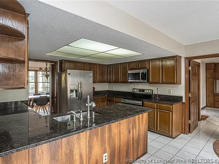 6821 Thames Dr — Photo 19