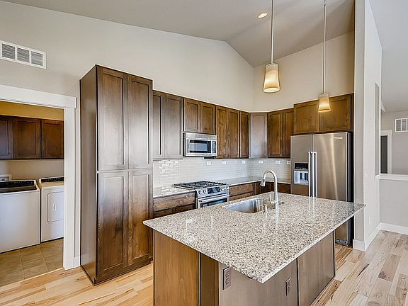 5th image of 8753 E 55th Ave