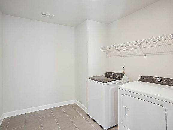 Laundry day just got easier with all the space to sort and fold your clothes.