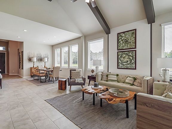 7-HOU-chesmarhomes-ORLANDO-A-HuntersCreekMODEL-living.jpg