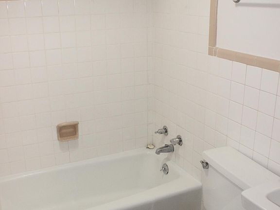 Bathroom with classic tile finish