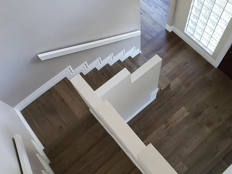 Fun perspective of stairs leading up to second floor.