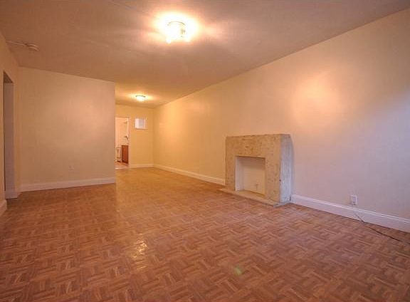 Huge Living Room & Dinning Room Area With Historic Fireplace