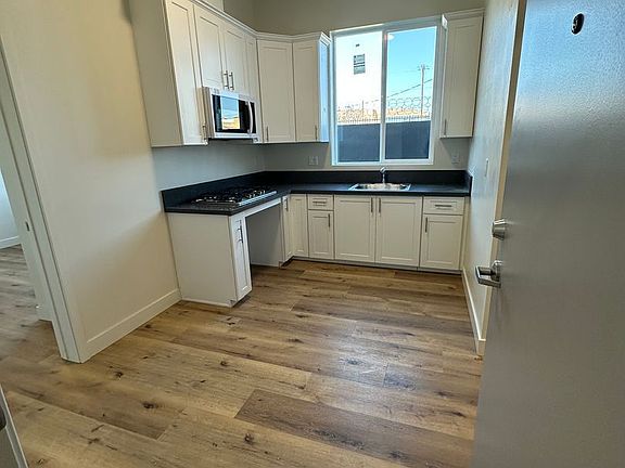 2nd image of 10914 S Main St #104