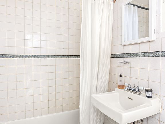 4th image of 227 E 12th St APT 3B