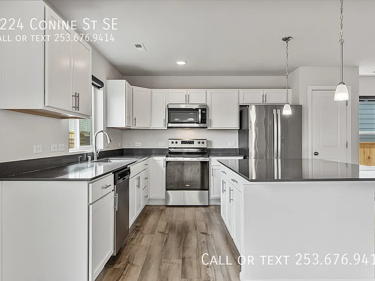 9224 Conine St SE — Photo 2