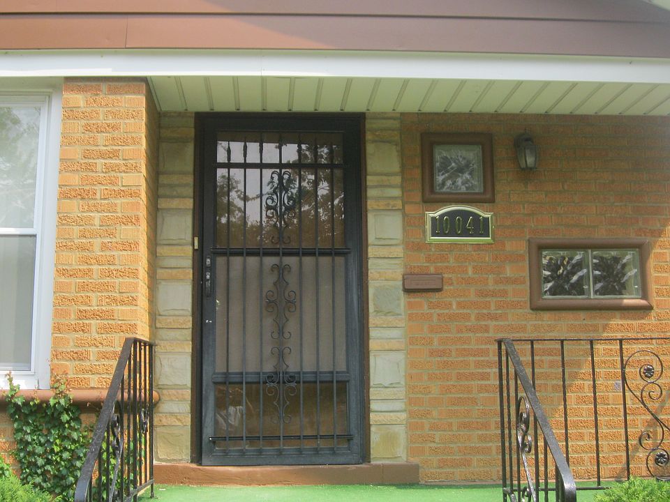 Front entry with wrought iron door