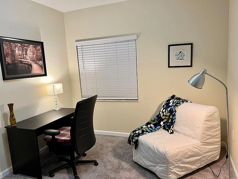 Study, with recliner/pull-out single-bed, and a desk and a chair for those wanting to remote work.