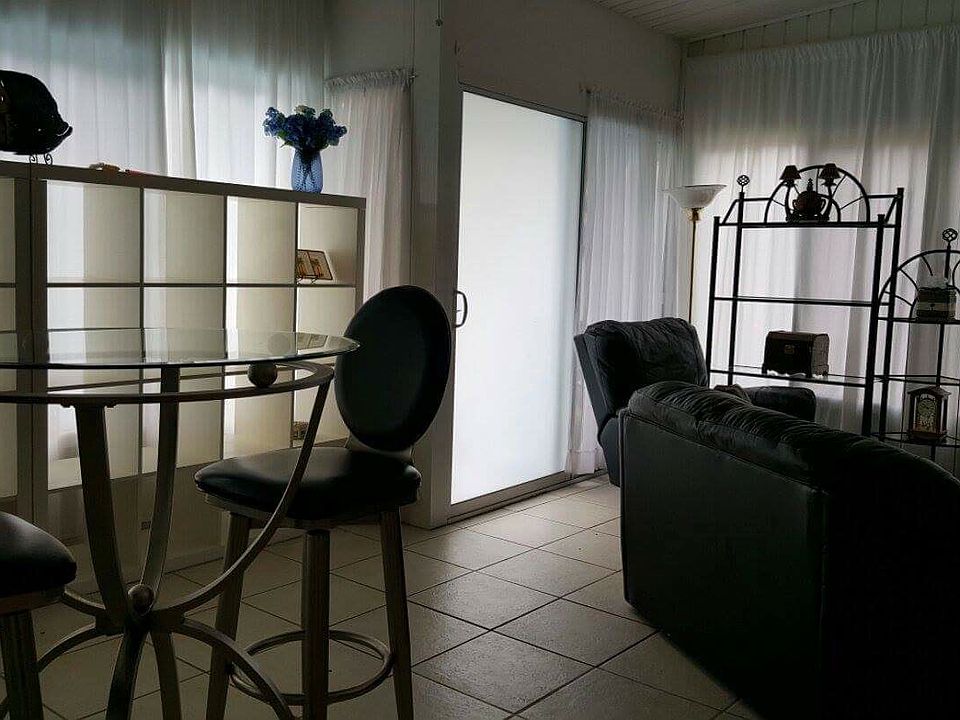This picture is the living area and dining area which opens