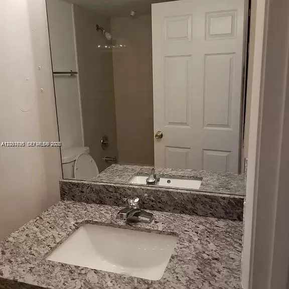 2890 N Oakland Forest Dr #111 — Photo 9